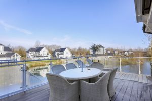 First Floor deck dining area- click for photo gallery